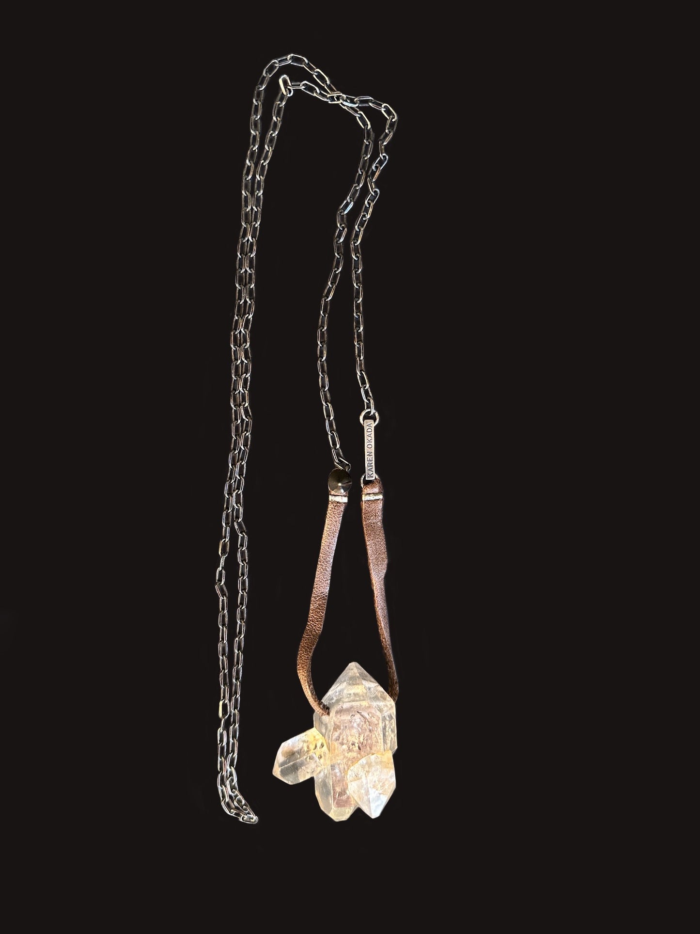 060. Rare “Enhydro” Double Fractionated Tibetan Crystal on Leather & Black Chain