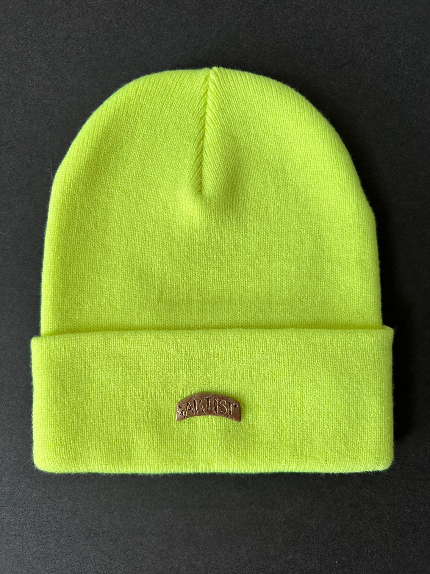 028. Bronze “ARTIST” Beanie in fluorescent green