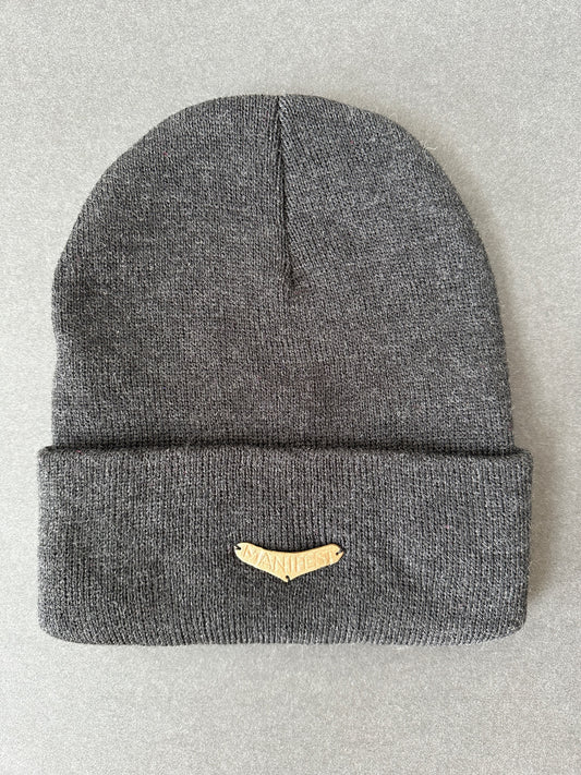 027. Bronze “MANIFEST” Beanie in charcoal gray